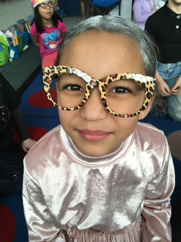 A first grade student dressed as someone 100 years old
