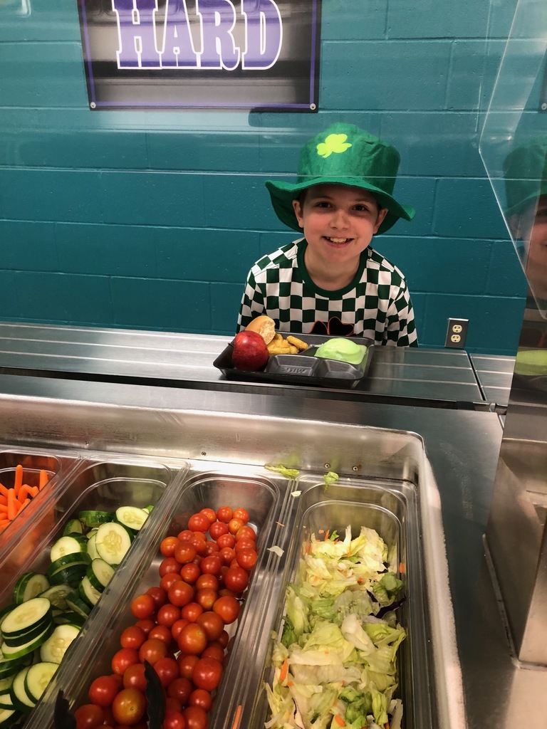 Aryn showing off St. Patrick's Day attire while in our lunch line. 